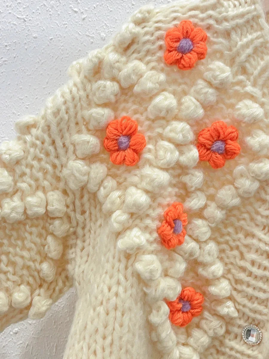 Round neck long sleeved three-dimensional handmade flower loose and fashionable knitted cardigan