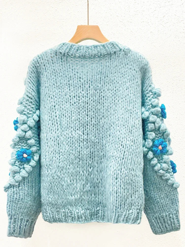 Round neck long sleeved three-dimensional handmade flower loose and fashionable knitted cardigan