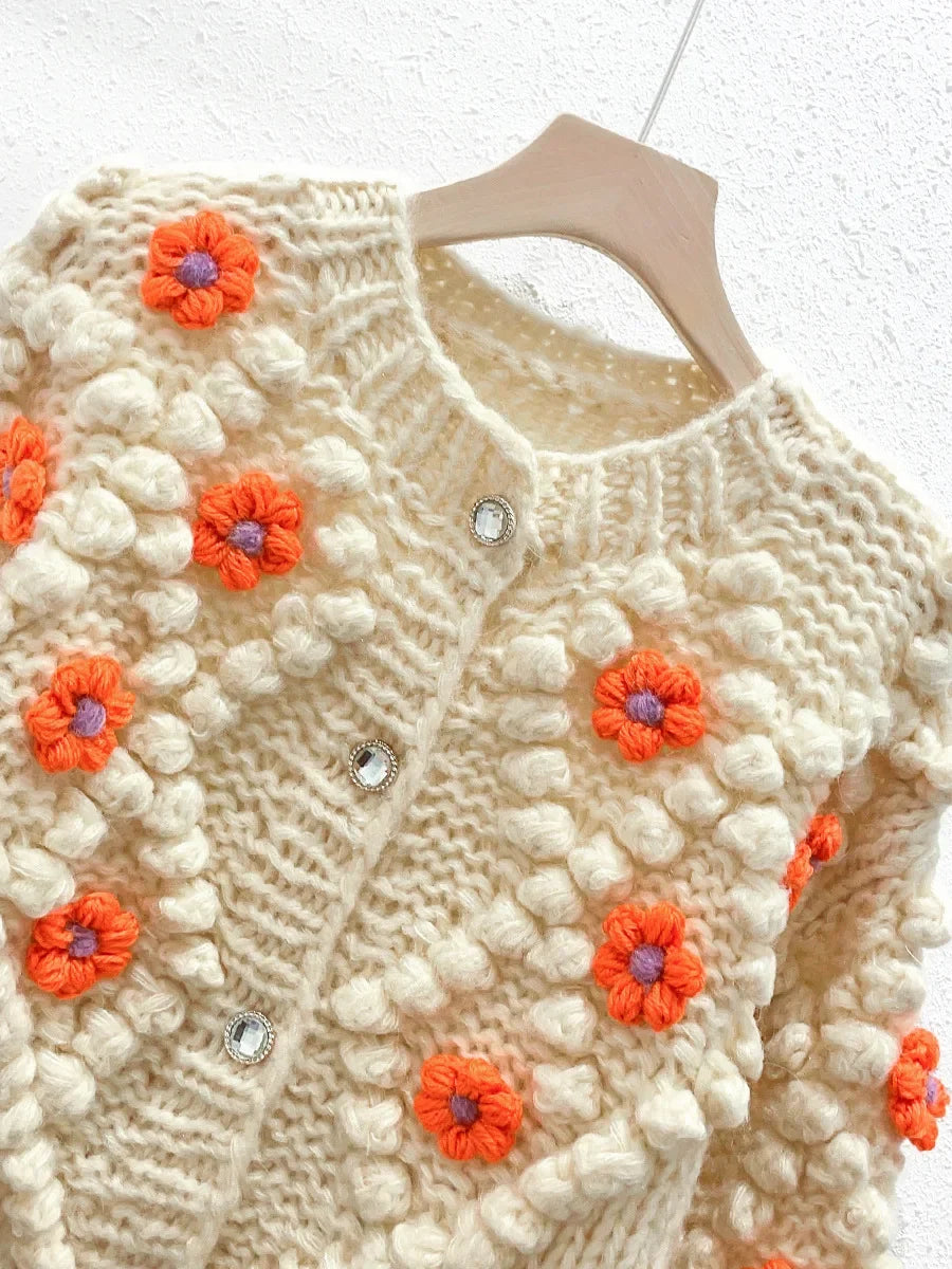 Round neck long sleeved three-dimensional handmade flower loose and fashionable knitted cardigan