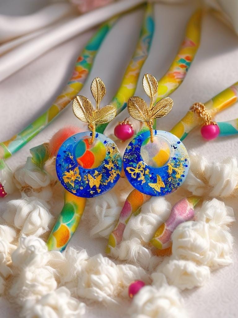 Boucles d'oreilles " papillons des lagons " en résine bleu océan, rêve tropical , fait main