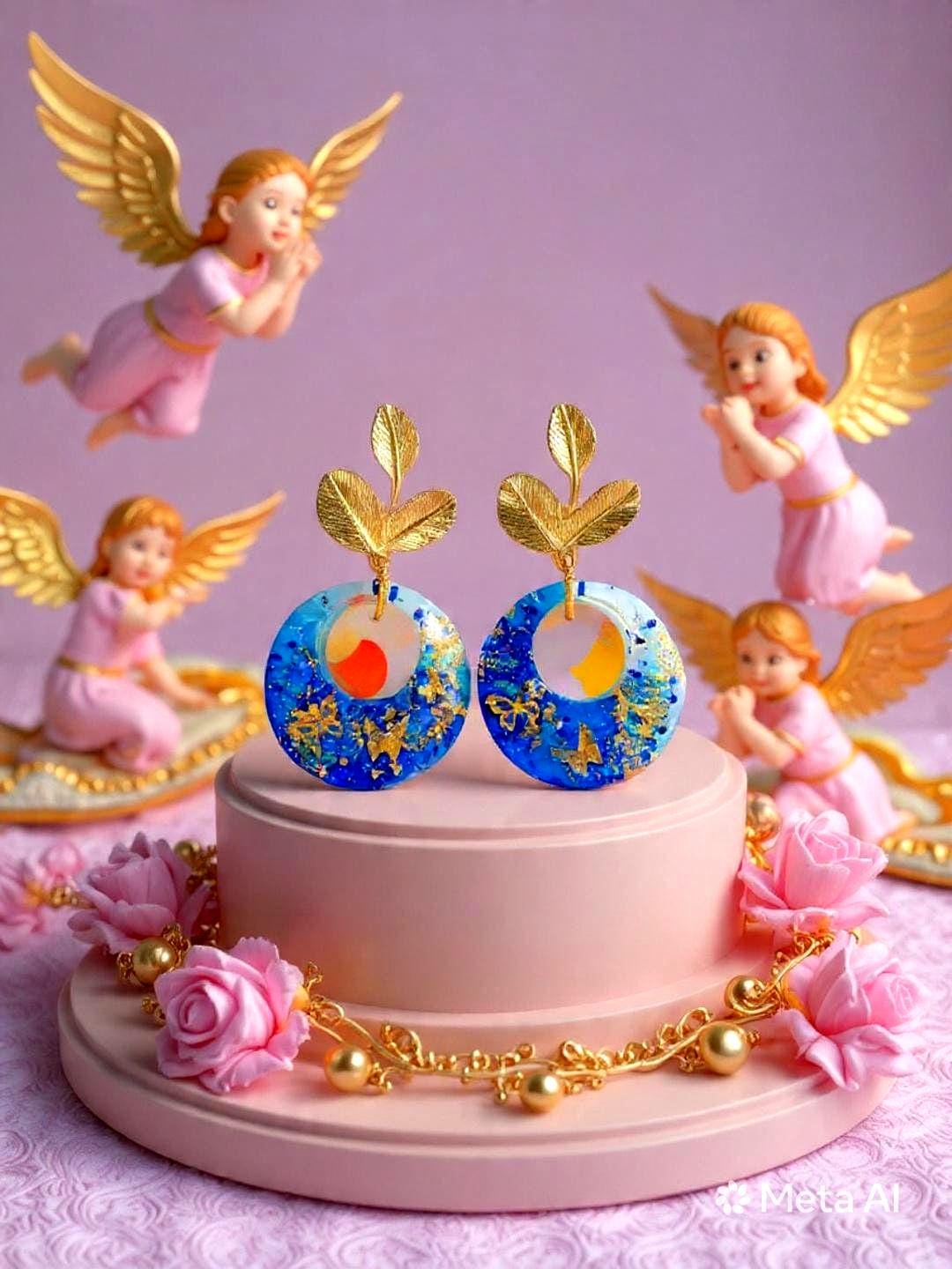 Boucles d'oreilles " papillons des lagons " en résine bleu océan, rêve tropical , fait main